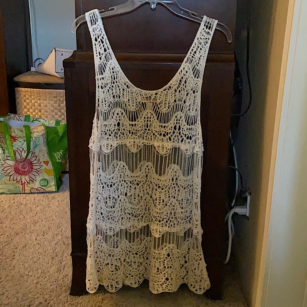 Beautiful off white sheer crocheted top/cover-up.